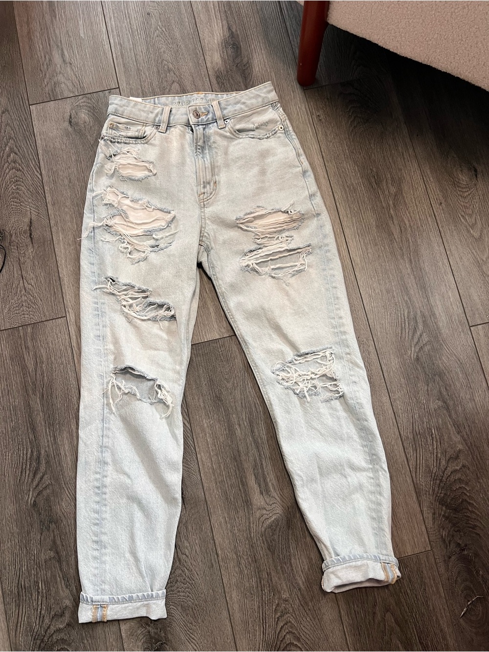 American Eagle Light Wash Ripped Ultra High-Rise Mom Jeans